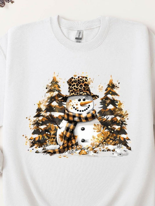 Women's Graphic T-Shirt Snow Covered Trees With Golden Leaves Surrounding A Smiling Snowman