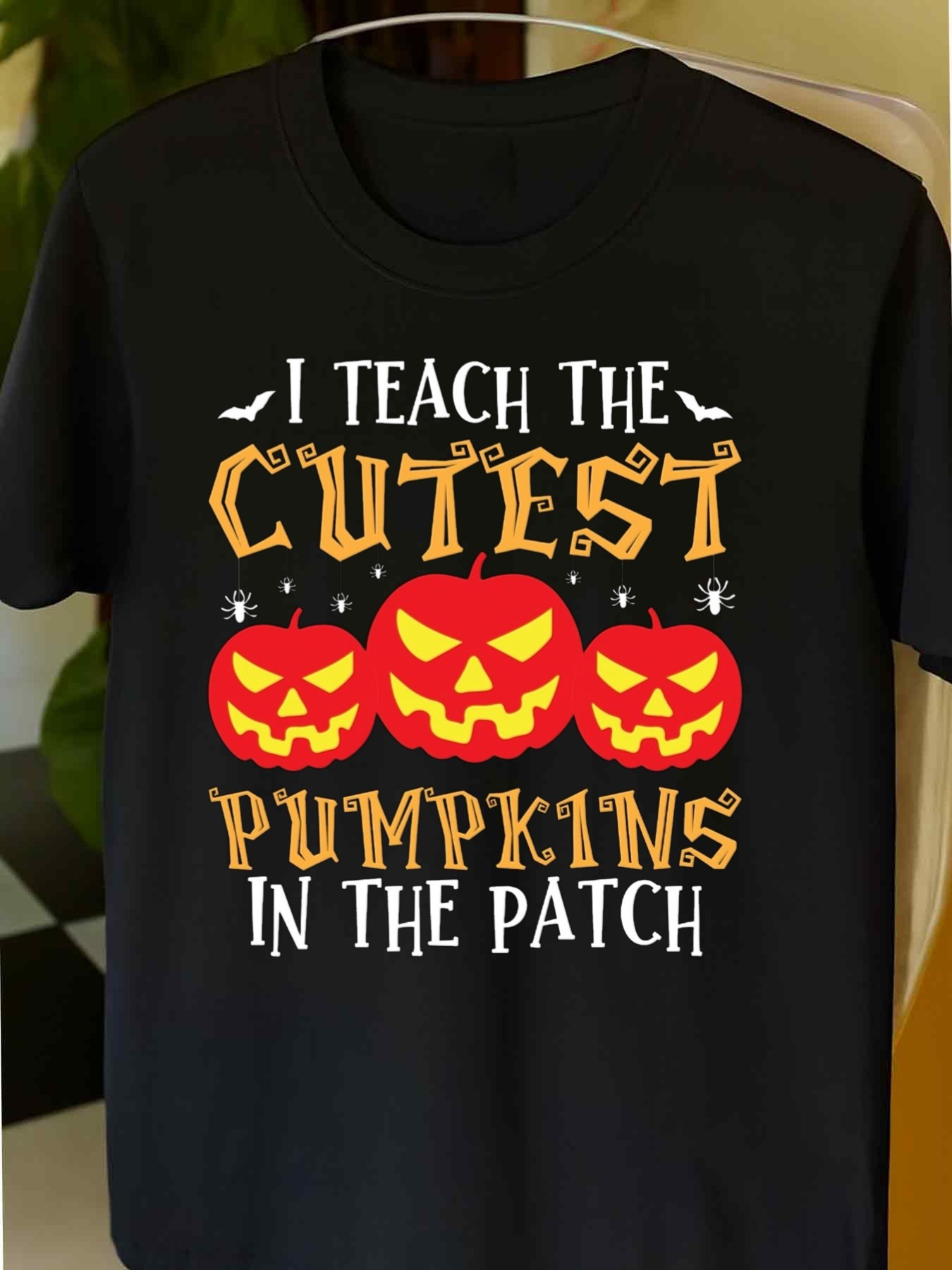 Men's Graphic T-Shirt I Teach The Cutest Pumpkins In The Patch Surrounded By Smiling Orange Halloween Pumpkins