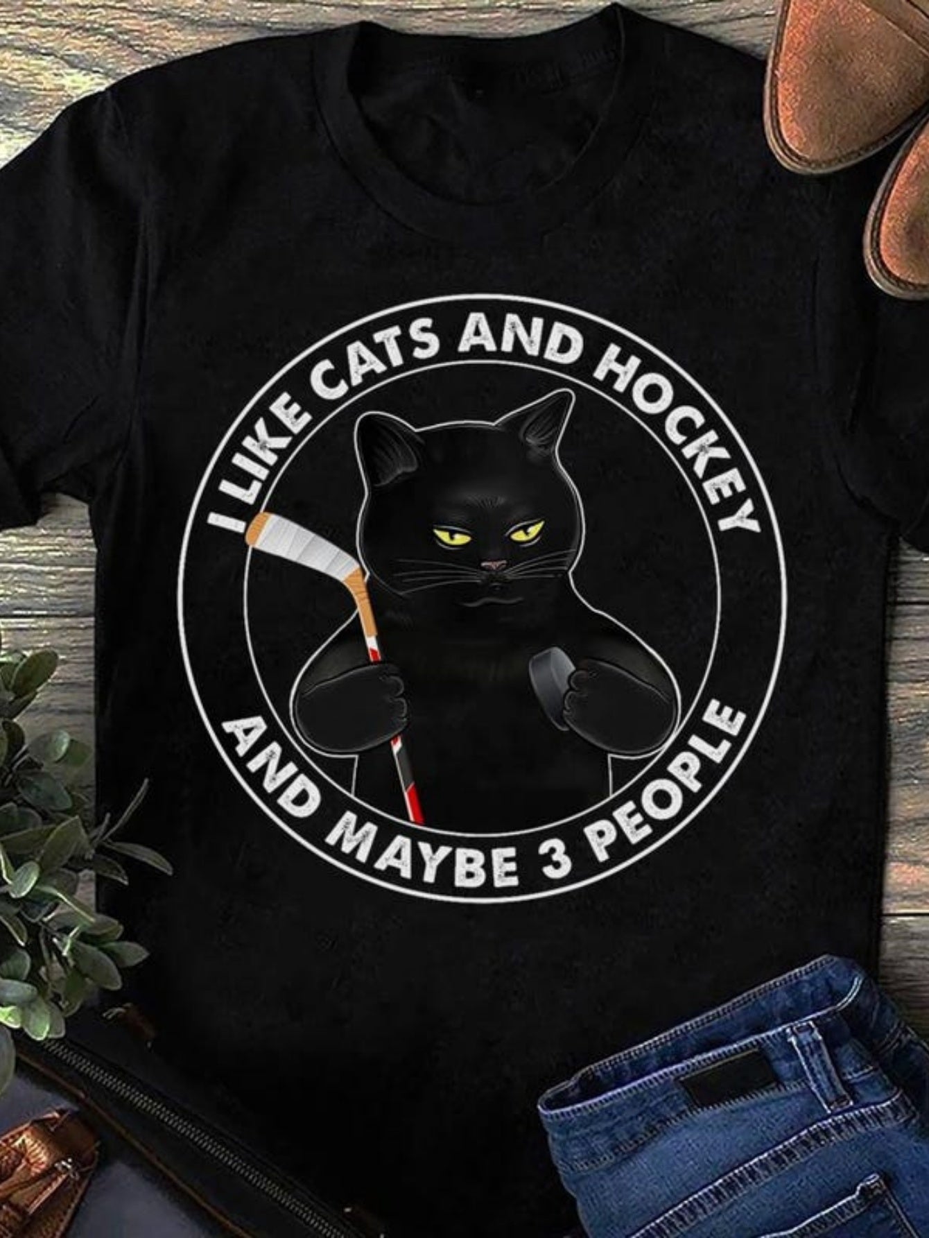Men's Graphic T-Shirt I Like Cats And Hockey With A Grumpy Black Cat Holding A Hockey Stick