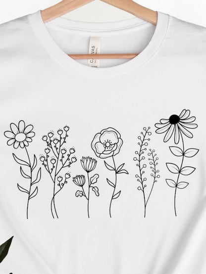 Men's Graphic T-Shirt Whimsical Delicate Linework Flowers Blooming Across The White Cotton Tee