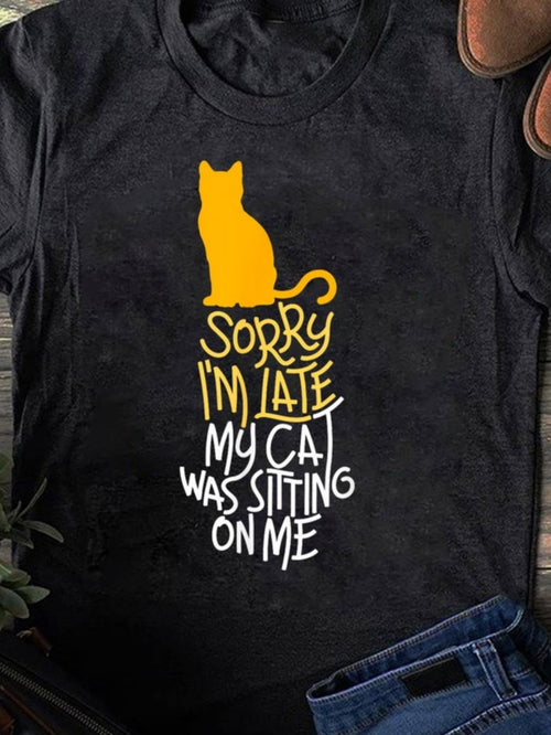 Men's Graphic T-Shirt Sorry Im Late Playful Orange Cat Sitting On Cozy Black T Shirt