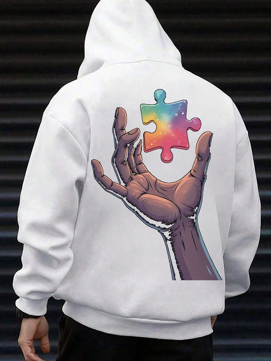 Men's Graphic Hoodie Galactic Puzzle Piece Floating Above Outstretched Human Hand