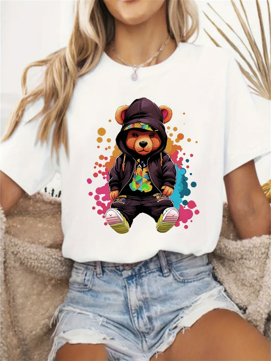 Women's Graphic T-Shirt Cool Cartoon Streetwear Style Wearing Hoodie And Cap Among Vibrant Colorful Splatter Bear